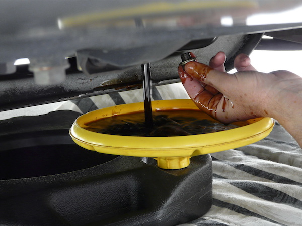How To Clean Oil Spill In Car Trunk